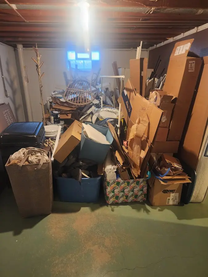 Roll-off dumpster container at job site for Yard Waste Dumpster Rental in Woodmoor